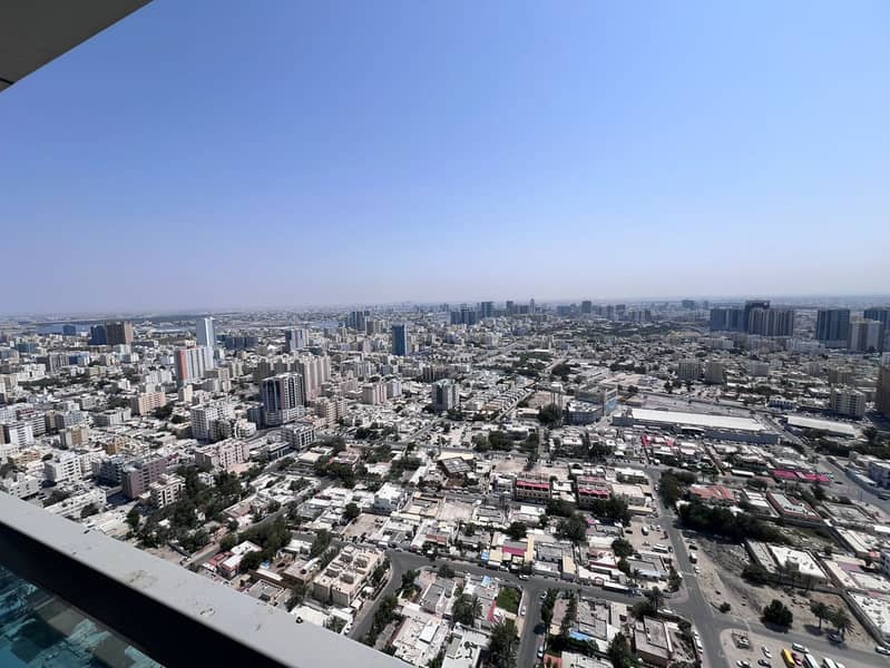 1-bedroom apartment for annual rent in Corniche Towers, Ajman, prime location on Ajman Corniche, AED 39,000 yearly in 4 payments.