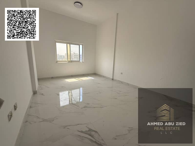 Largest one-bedroom apartment for annual rent in Ajman – Al Muwaihat 3 | Brand new building, first occupancy | Balcony with open view | 2 bathrooms |