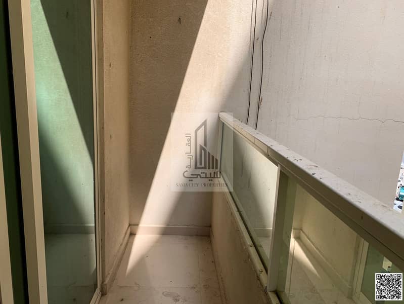 One-bedroom apartment with a living room and bathroom for rent in Al Hamidiya 2.