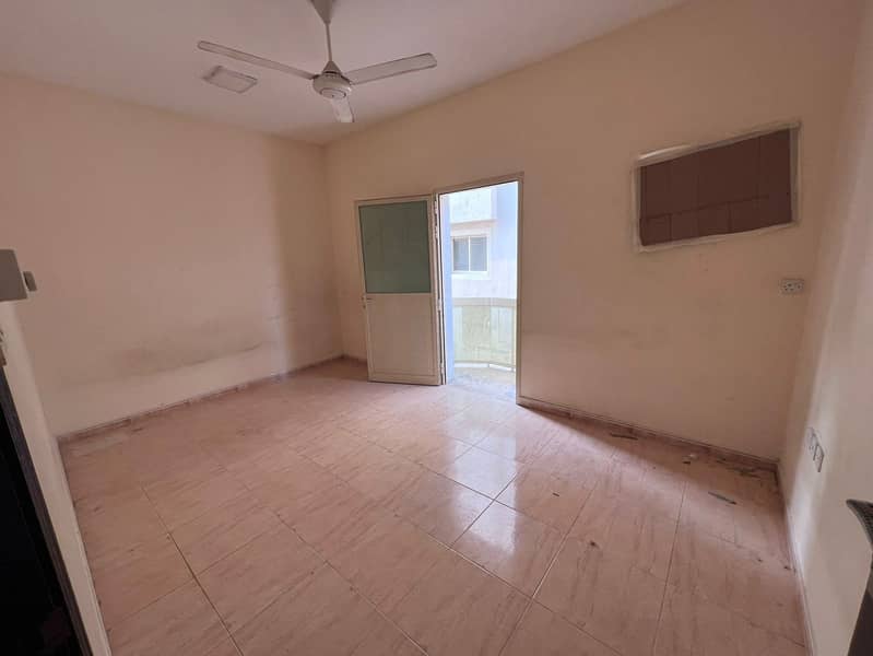 One-bedroom apartment for annual rent in Al Rawda 3, Ajman, in a prime location directly on Sheikh Ammar Street, close to all amenities such as market