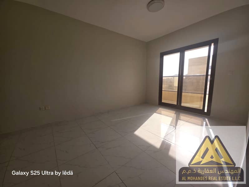 One bedroom and living room apartment for yearly rent with very large space in Al Rawda second tenant with excellent layout and clean finishing in a p