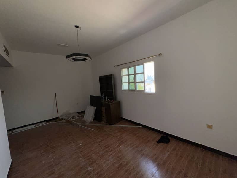 One bedroom and living room in Al Rashidiya 2, open view, next to the fish market, central air conditioning, 30 (presumably referring to a price in 6