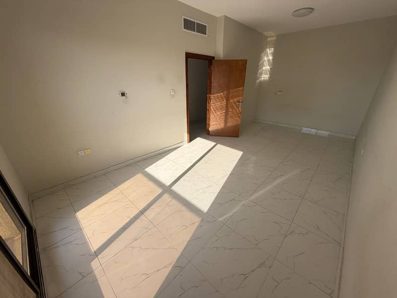 One-Bedroom Apartment for Annual Rent in Al Rawdha 1 Ajman Spacious Master Bedroom 2 Bathrooms Balcony Separate Hall Central AC Prime Location