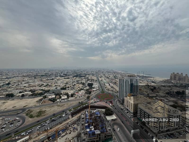 3BR apartment Ajman One Towers, 5 baths, maid & laundry, 2 balconies sea view, free parking, garden, gym & pool, annual 70,000 AED.