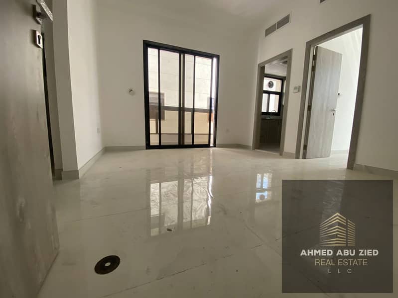 1-bedroom apartment for annual rent in Al Aaliyah, Ajman, first tenant, master room, 2 baths, balcony, built-in wardrobes, equipped kitchen, prime