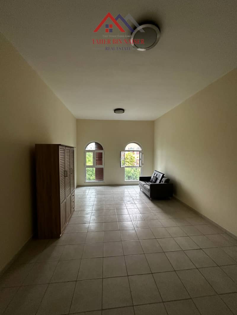 Large Studio | French Balcony | Semi Furnished | Discovery Gardens