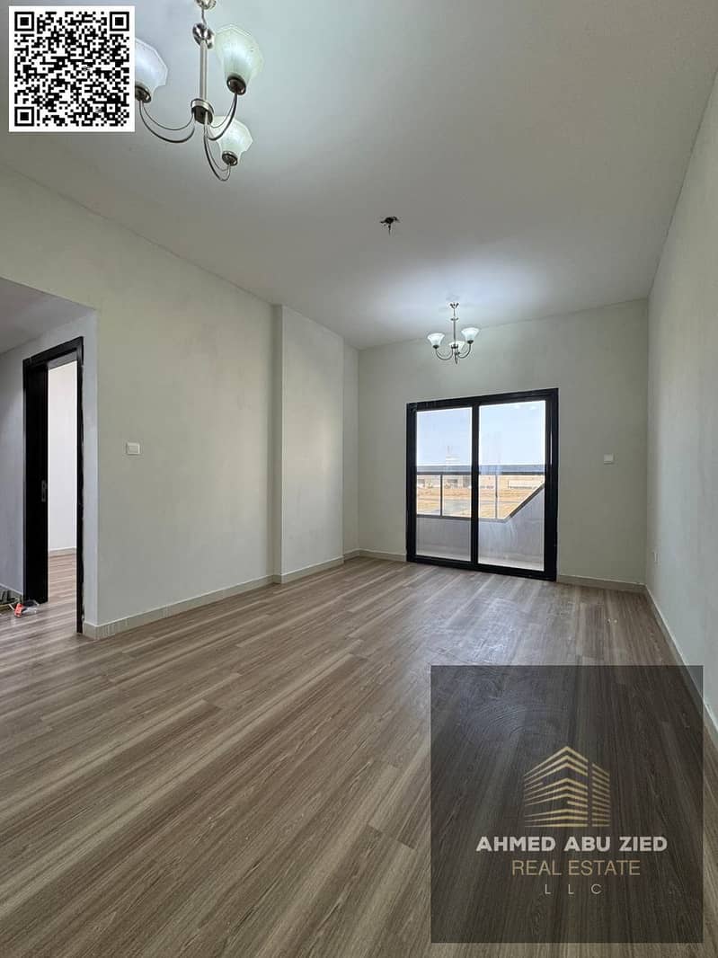 Elegant and beautiful two-bedroom apartment with a living room, two bathrooms, central air conditioning, balcony with an open view, excellent finishin