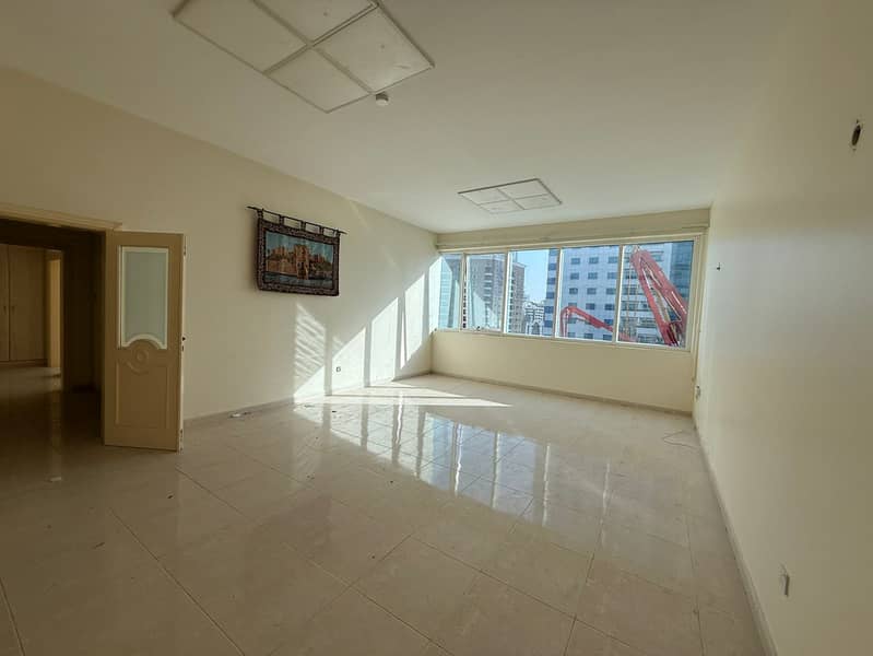 Luxury 2BR apartment with living room, built-in wardrobes, free AC, super deluxe finishing, excellent payment plans, prime location near all services