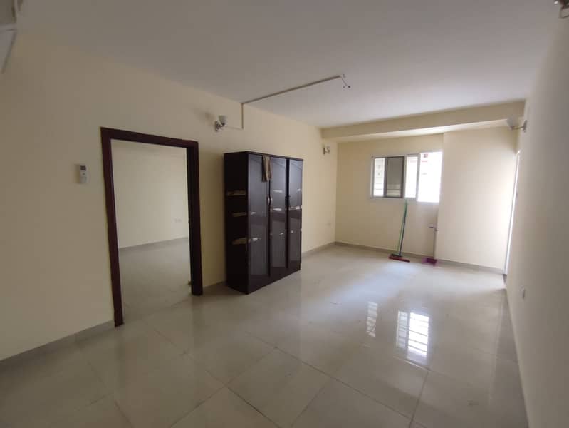 One-bedroom apartment for annual rent in Al Rashidiya 2, with two bathrooms and a laundry room.