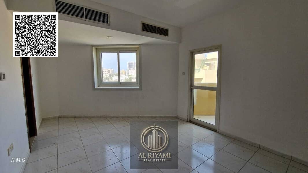 Studio apartment for annual rent with balcony and separate kitchen, Al Rashidiya 3, Ajman