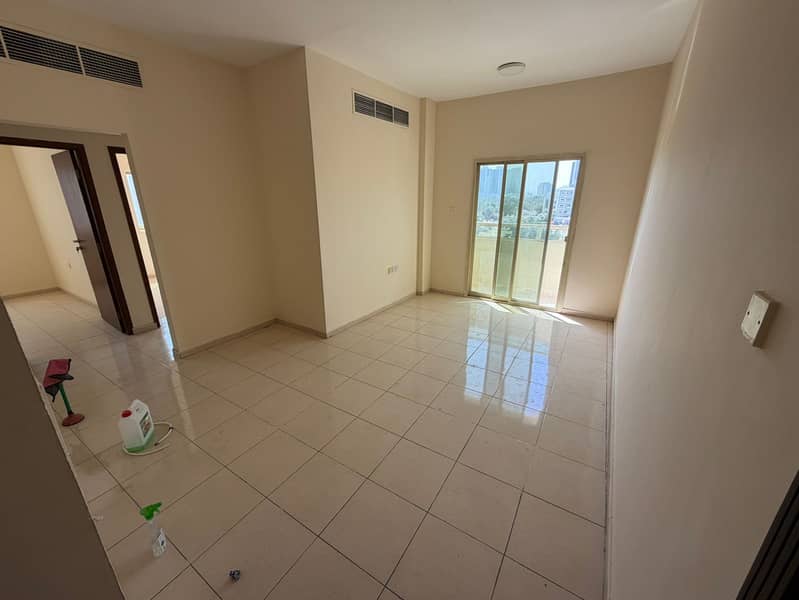 Two-bedroom apartment for annual rent in Al Rashidiya, Ajman, in a prime location close to all amenities such as markets,