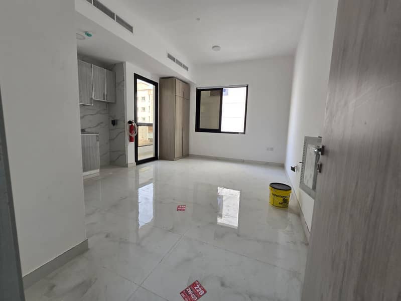 Brand new studio apartment for rent in Al Alia for AED 22,000 per year, payable in 4 installments. Located behind Bait Al Mutwahid. Central air condit