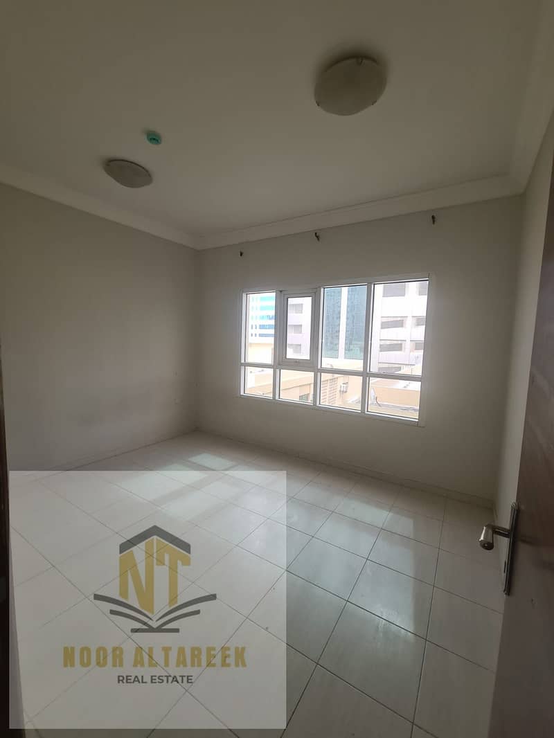 Al Majaz 1, two rooms, a living room, and two bathrooms, without administrative fees and a Mogul check deposit