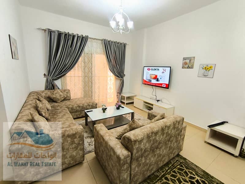 Monthly rent for a one-bedroom apartment with a living room, two bathrooms, and a balcony, including bills and free maintenance by the owner.