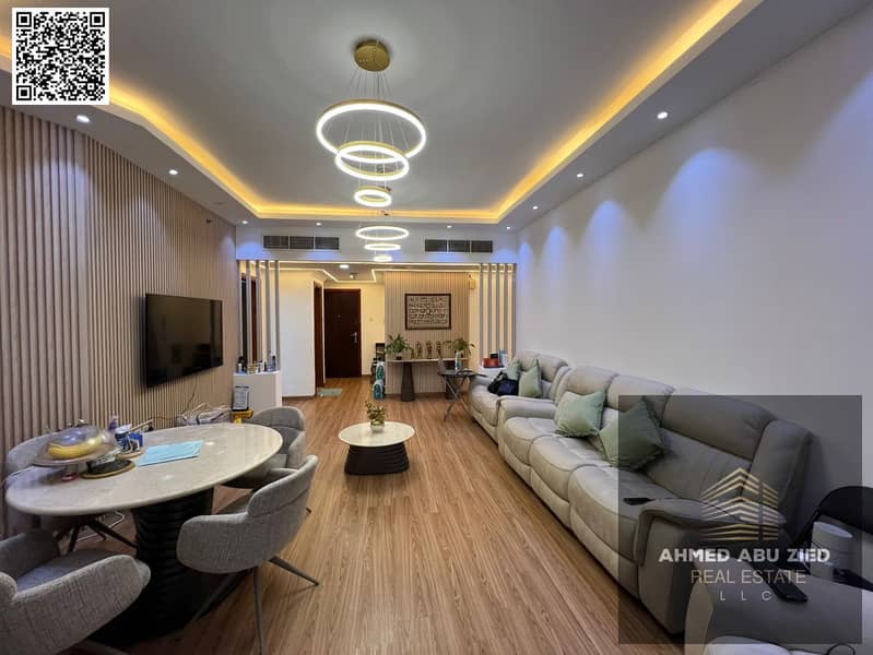 Two-bedroom apartment with a private rooftop and panoramic sea view for annual rent in Orient Towers, including a master bedroom and three bathrooms –