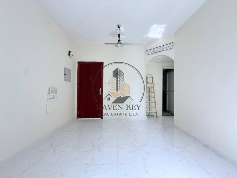 VERY SPACIOUS 1BHK REDY TO MOVE APARTMENT ON RODE BULDING GOOD LOCATION MUWAILAH SHARJAH
