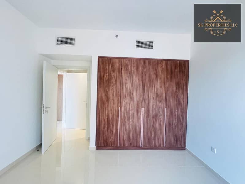Luxury Pool View 1BHK | 700 Sqft | Covered Parking | Premium Amenities | Uptown Al Zahia