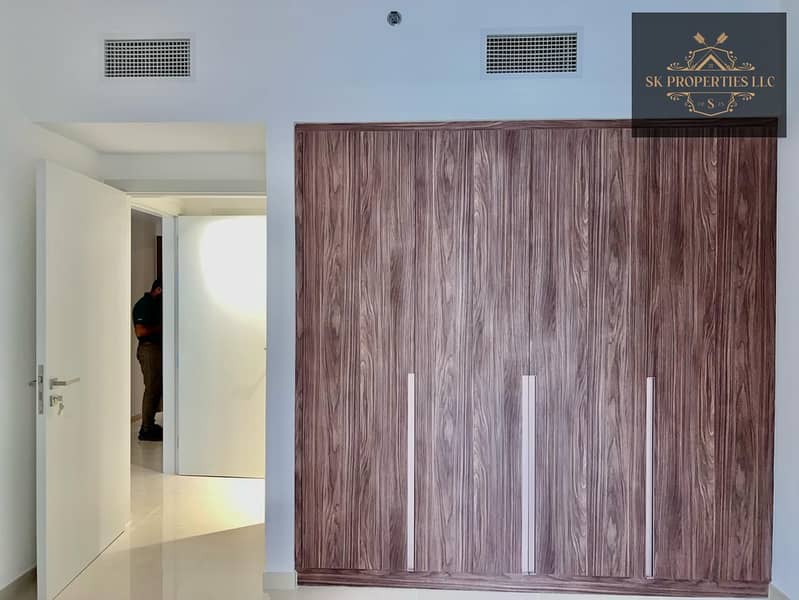 Luxury Pool View 1BHK | 700 Sqft | Covered Parking | Premium Amenities | Uptown Al Zahia