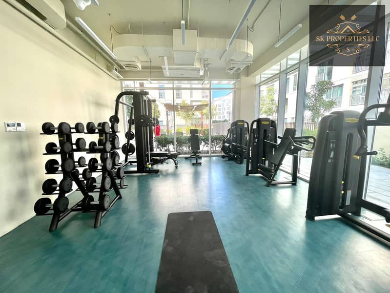 Luxury Pool View 1BHK | 700 Sqft | Covered Parking | Premium Amenities | Uptown Al Zahia