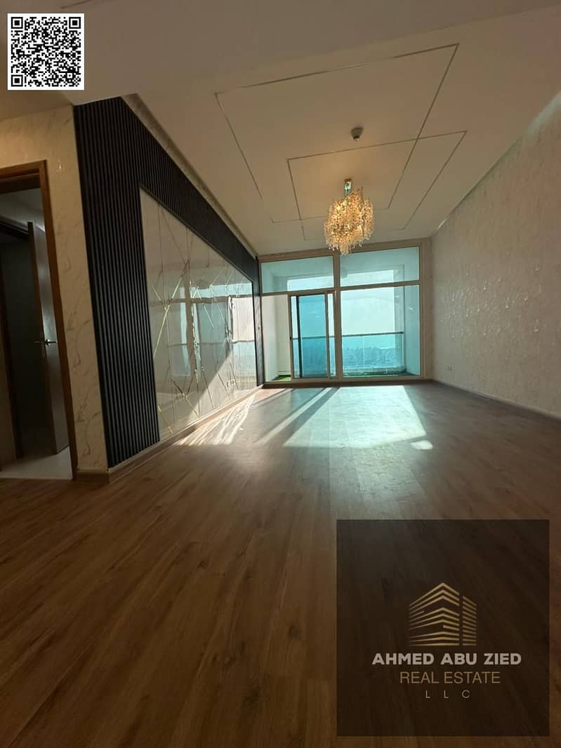 Three-bedroom apartment with a living room and balcony for annual rent in Ajman One Towers – luxury finishes with private parking, maid's room,