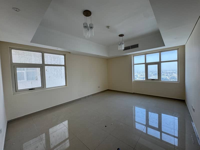 One-bedroom apartment with hall for annual rent in Al Naeemia, Sheikh Khalifa Road, Ajman, 2 bathrooms, wall cabinets, no parking, 36,000 AED in 4 ins