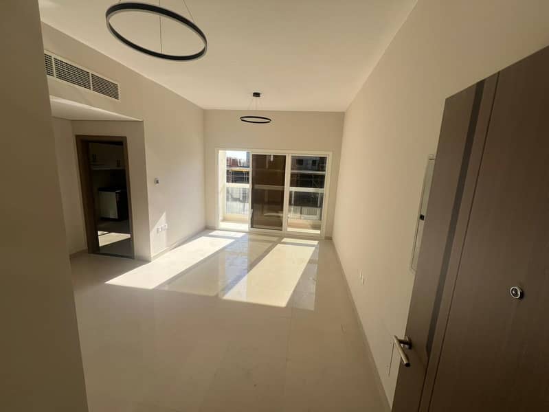 A fantastic opportunity for annual rent in Al Jurf 3: a brand new, two-bedroom apartment with a living room, never before occupied, in a new building