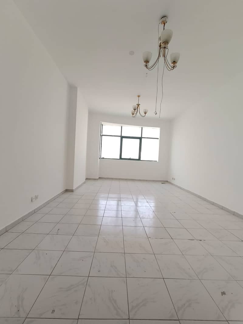 2BR apartment for rent in Al Jubail Sharjah, large space with hall and 2 master baths, central AC, prime location, 39000 AED, 4 or 6 payments!