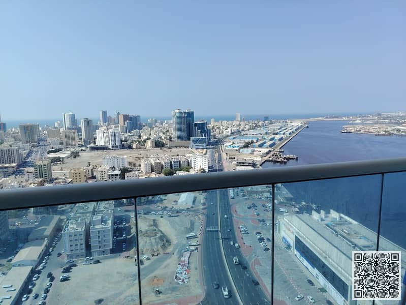 Luxury apartment for monthly rent, two bedrooms and a hall with a sea view, fully furnished with high-end hotel furniture and a fully equipped kitchen