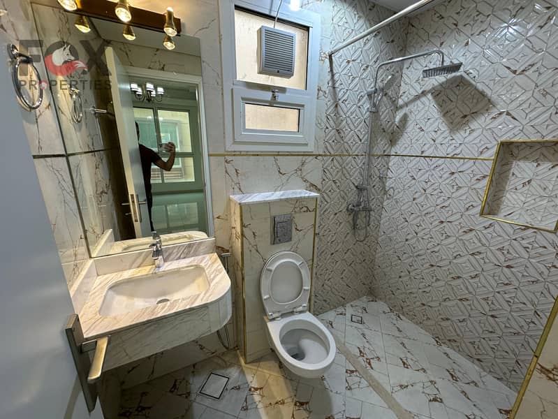 A two-room apartment, a living room and a sitting room in Al Mowaihat 3 - Ajman, a unique opportunity to live in a vital location and close to Schools