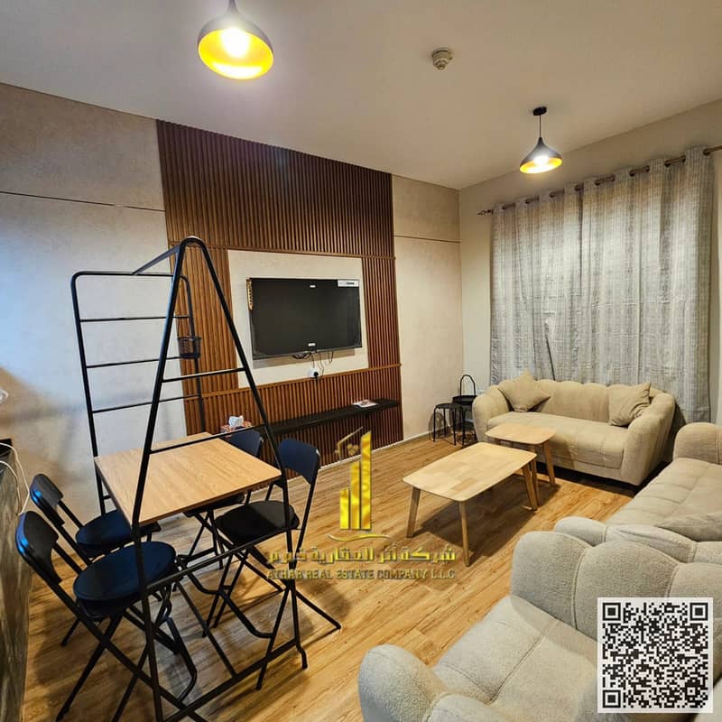 Furnished one-bedroom apartment for monthly rent in Ajman - Khalifa Street, City Towers Includes bills and internet Ready to move in