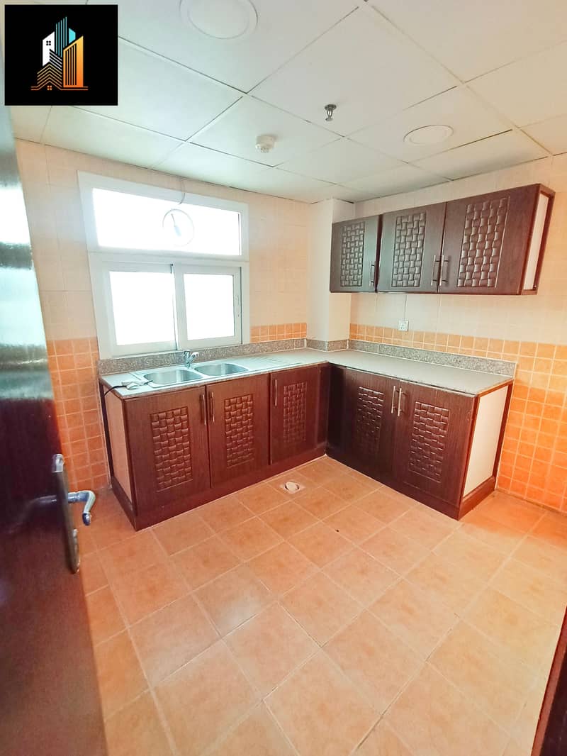 NEAR TO SHARJAH BUS TERMINAL 1BHK/2 BATHROOMS AND CLOSE HALL WITH CENTRAL AC