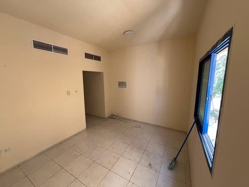 Studio with separate kitchen for rent in Al Nuaimiya 2 Ajman AED 18K in 4 payments near Afghan Kebab and Thumbay Hospital on Sharjah exit practical la