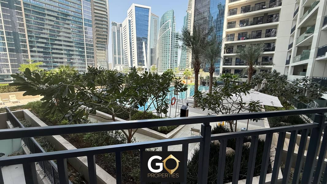 Furnished 1BR | Multiple Balconies | City & Pool Views