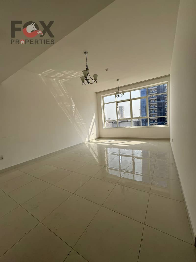 A two-bedroom apartment and a lounge in Al Rashidiya - Ajman, a unique opportunity to live in a lively location. An apartment with a modern design and