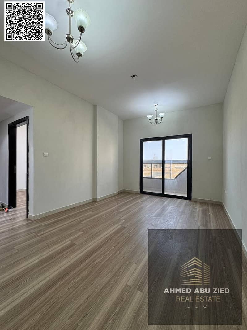 Two-bedroom apartment with a living room for annual rent in Al Jurf 3, Ajman, with private parking and parquet flooring. Close to the Chinese market a