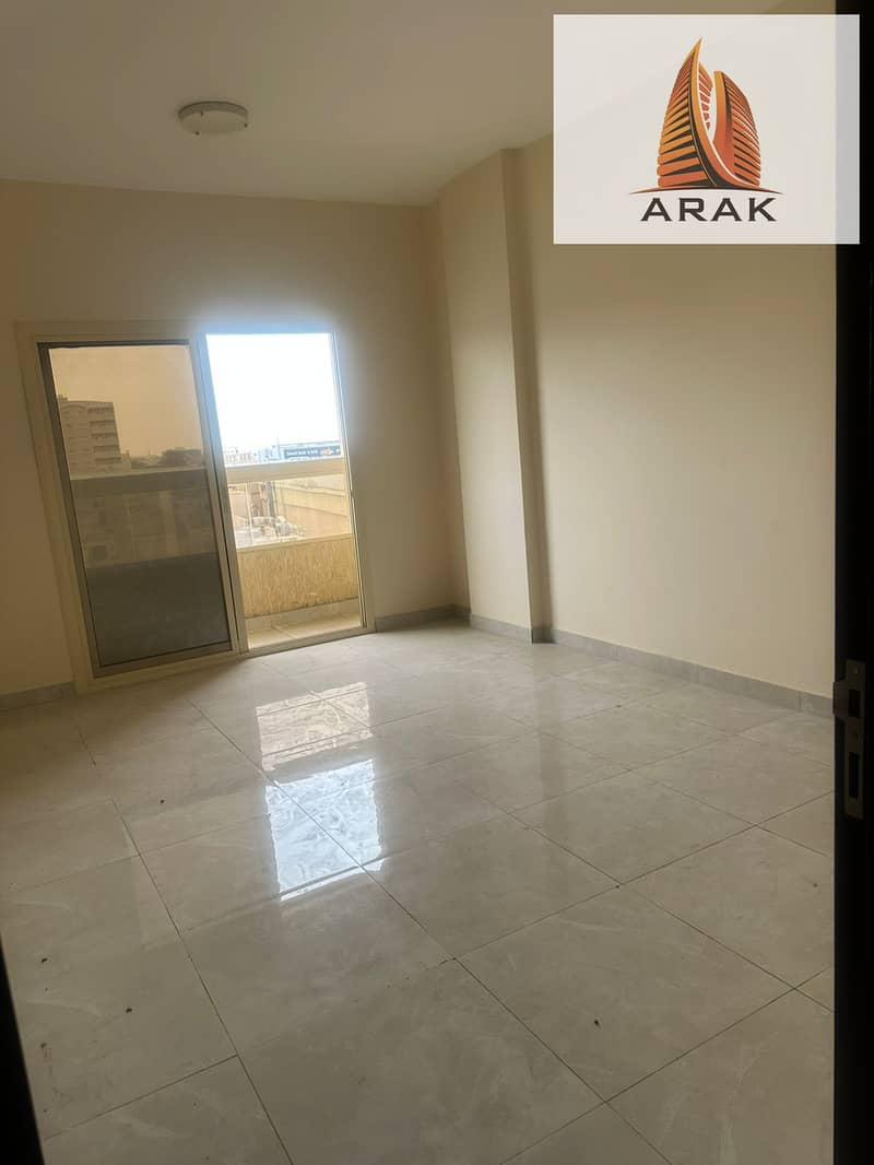 A spacious two bedroom apartment with a living room is available for annual rent in Al Jurf 2, Ajman, located in a convenient area close to all servi
