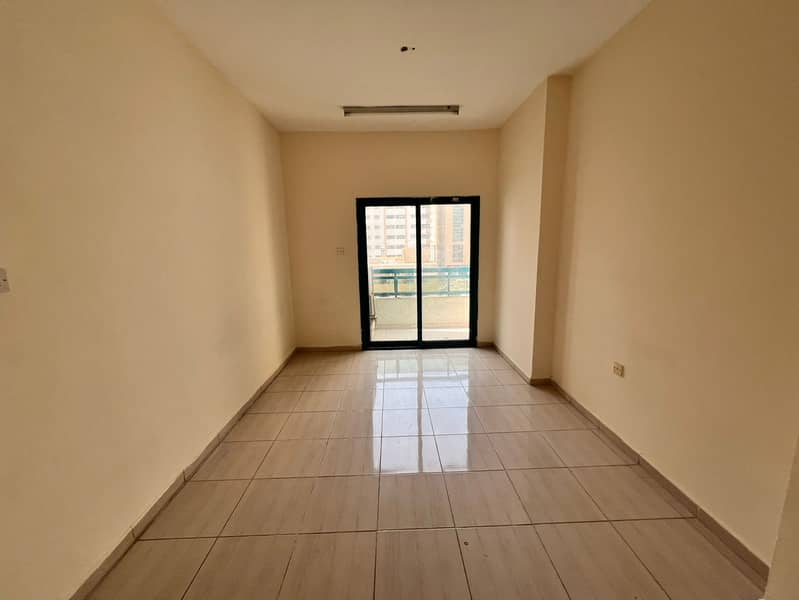 Two bedrooms and a living room with spacious layout and a balcony. Prime, lively location near all services and close to the Dubai exit.