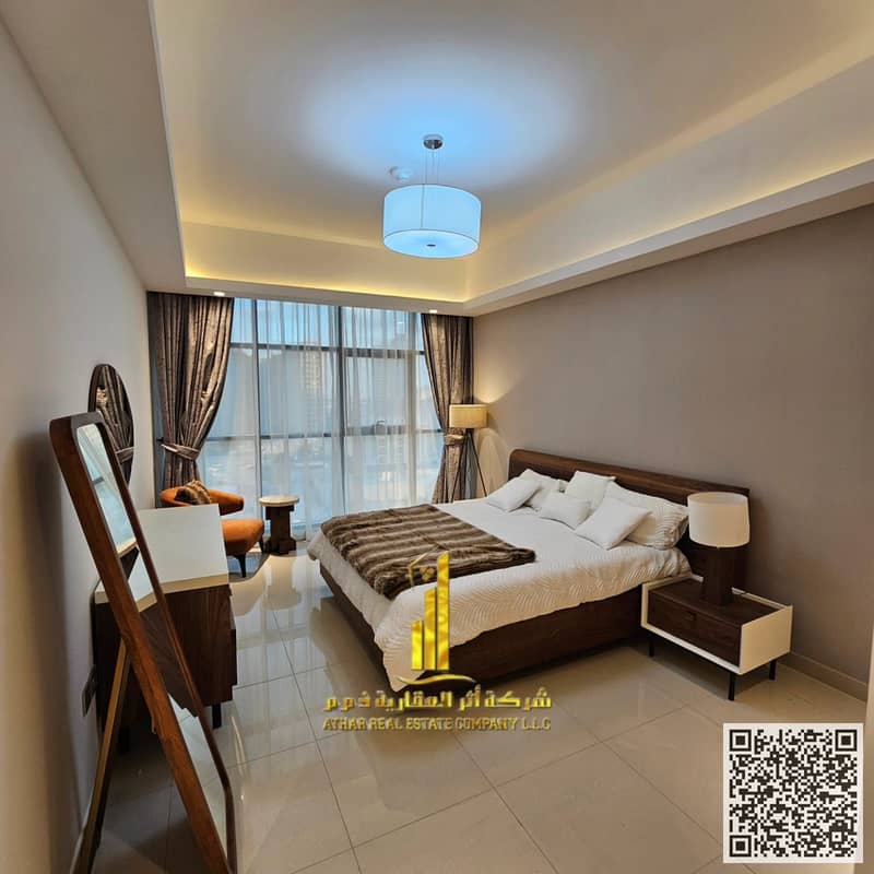 Furnished one-bedroom apartment for monthly rent in Ajman - Al Rashidiya - Gulf Towers Includes all bills and internet, with gym, pool, and parking
