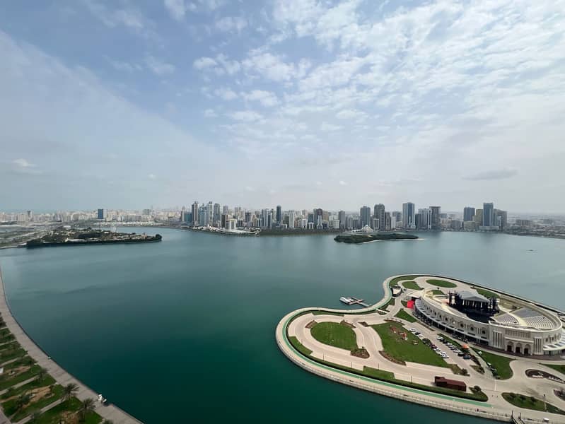 Stunning sea view with a balcony directly overlooking Al Majaz Theatre 3. Three-bedroom apartment with a master room on Al Majaz Corniche, direct