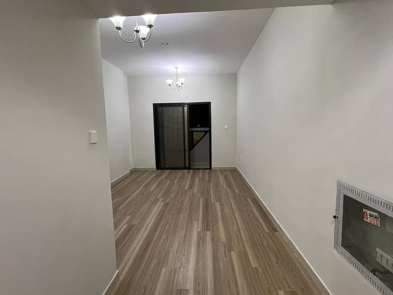 2-bedroom apartment and hall in Al Jurf 3, balcony, central AC, maintenance by owner, free parking, AED 41,000 in 6 payments, prime location near Ajma