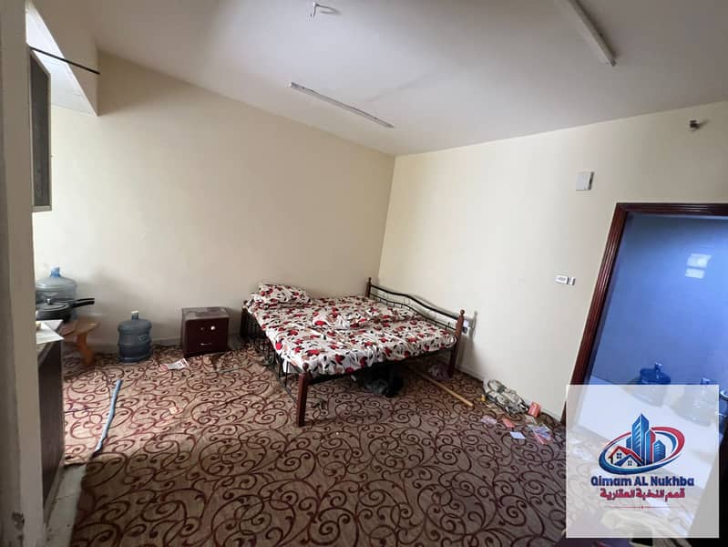 Sharjah Studio in Al Ghuweir – Separate Kitchen, Central Gas, Practical Layout, Rent AED 16,000, Flexible Payment 4 or 6 Cheques