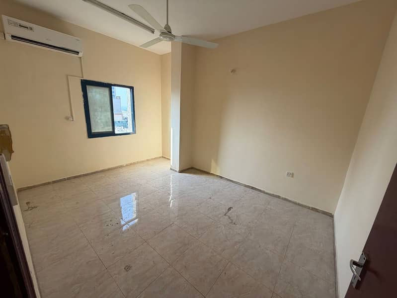 2 bedroom apartment with balcony for rent second row Ajman Corniche AED 35K in 6 payments 2 bathrooms separate living room bright apartment prime loca