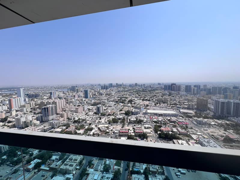 1BR Apartment in Ajman Corniche Towers – Sea View – 39K in 4 Payments