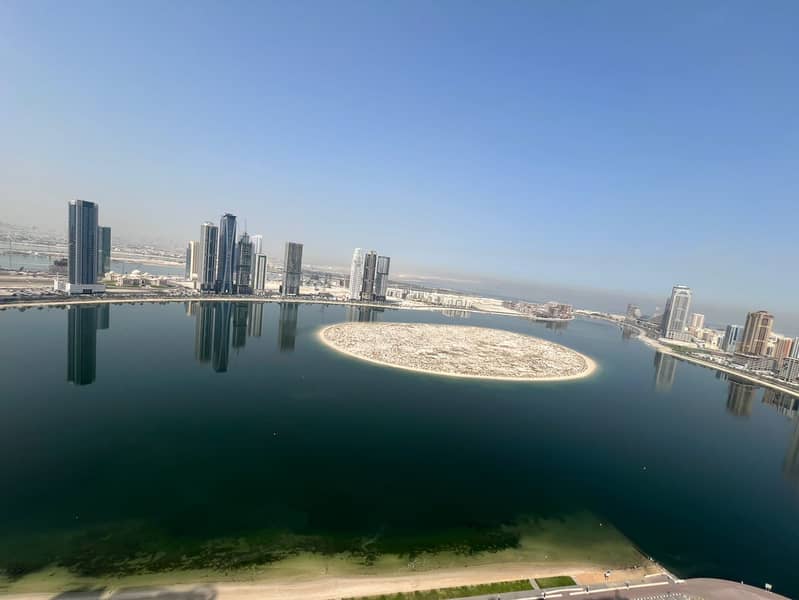 Full sea view luxury 2BHK with balcony maid room free gym pool parking premium finishing spacious layout prime location with easy access to Du