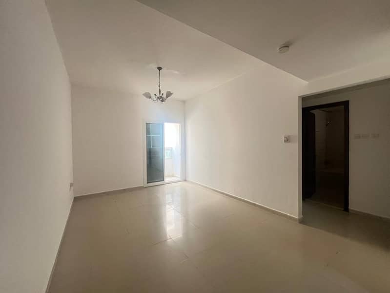 1BHK with balcony – Family tower – Prime location – 5 cheques – No deposit – Large kitchen – Near Dubai exit – Close to Al Taawun Street