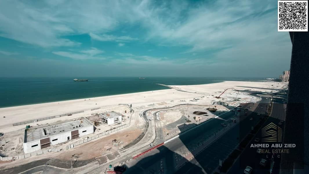 Luxury 3BR hall apt annual rent Ajman Corniche, spacious hall with balcony & open sea view, large bedrooms, equipped kitchen, prime location