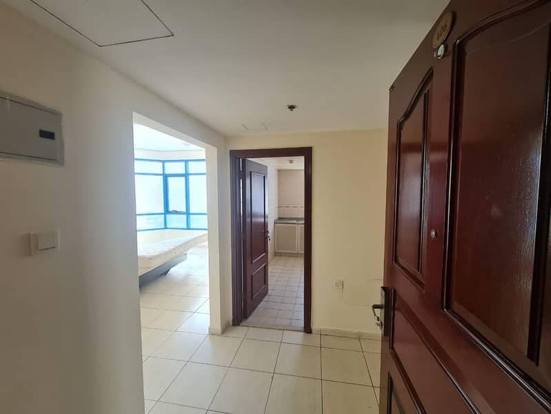 1BHK with balcony – Family tower – Prime location – 5 cheques – No deposit – Large kitchen – Near Dubai exit – Close to King Abdulaziz Street
