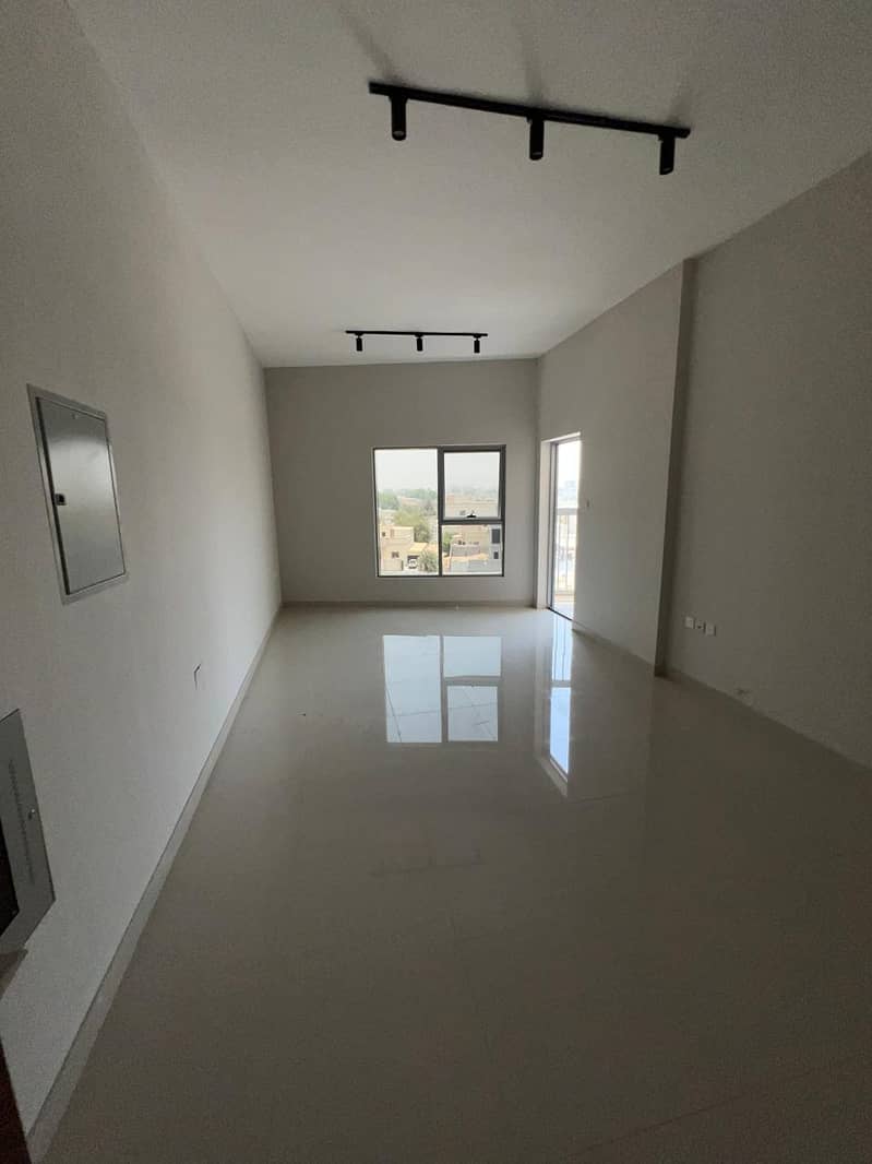 Two bedrooms and a living room, first occupancy, very prime location in Al Hamidiya, Ajman, near the court and Ajman University