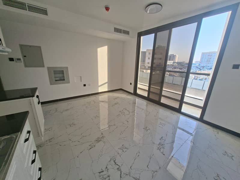Brand new building Muwaileh sharjah for studio apartment with balcony open view in school area