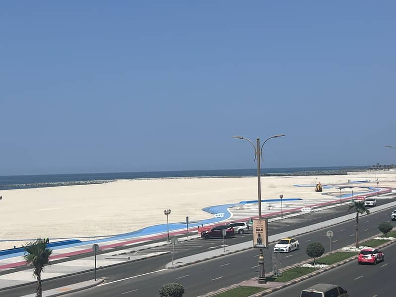 Two-bedroom apartment with a living room, stunning sea view directly on the Ajman Corniche - very attractive price in a prime location